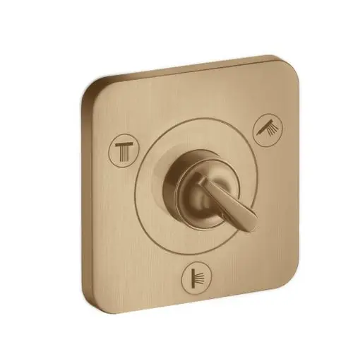 Wandmontiertes Umstellventil aus gebürstetem Bronze, ausgestattet mit einem Drehknopf zur Steuerung von Wasserströmen. Ein Produkt von AXOR.